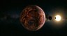 AN "IMPROBABLE" PLANETARY SYSTEM: COMPACT, COPLANAR, AND SHAPED BY A BROWN DWARF